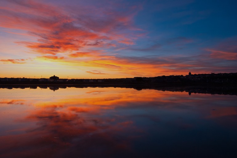Not a great deal to say hear - simply a powerful light show amplified through the still reflection of an ebbing tide.