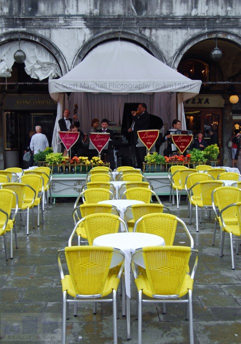 Situated on the sunniest corner of Piazza San Marco, at the foot of the Clock Tower, in front of the Basilica, the Caffé Lavena has been one of Venice's most renowned coffee boutiques since 1750.    The Caffé Lavena is a meeting place for illustrious Venetian guests and tourists, and has always actively participated in the cultural life of Venice, experiencing the most important historical events in the city during the 18th and 19th centuries. 