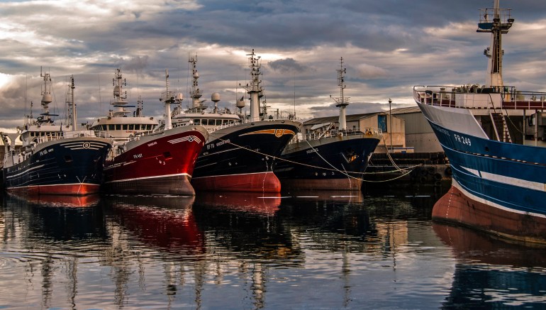 The last of Scotland's fishing fleet (we are an island nation) rest up - constrained by the terms of the European Union Fishery Agreement.  I do hope all signatory nations are as well behaved. It is a hugely contentious subject - but surely a policy which will preserve our fishing stocks for the future. The fishing industry must reduce waste and throwing of overcatch back to the sea is madness. Anyway i will jump off my environmental soapbox and get back back to the art. I have tweaked this in Lightroom and Nik Software to bring out the detail amongst the boats in what was a twilight image. I hope the tweaking is not too much - I don't personally enjoy overcooked images - enjoy hopefully.