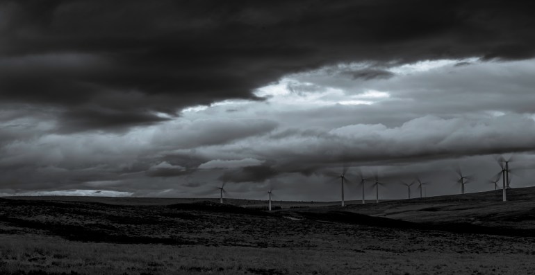 This is a dark and foreboding Rothes Wind Farm near Glenlatterach. A fabulously  dark sky coupled with a slow shutter speed to display the movement of you love it or hate it wind farm. Renewable must be Scotland's future. BT has agreed a £300m deal to buy enough energy to meet the needs of all its Scottish operations for the next 20 years from a wind farm in the Borders. I dont want to be held to ransom by foreign energy markets 